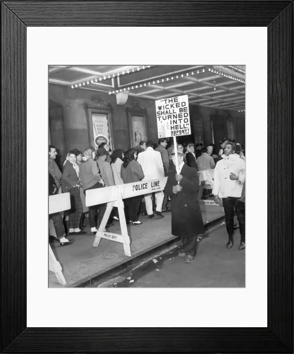 Framed Print : Religious Protester Holding Sign Framed Print : Religious Protester Holding Sign