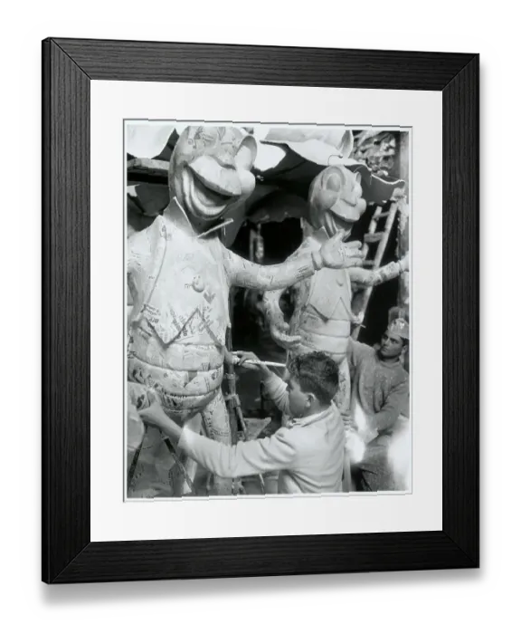 Framed Print : Men Working on Carnival Creatures by Pupazzo Framed Print : Men Working on Carnival Creatures by Pupazzo