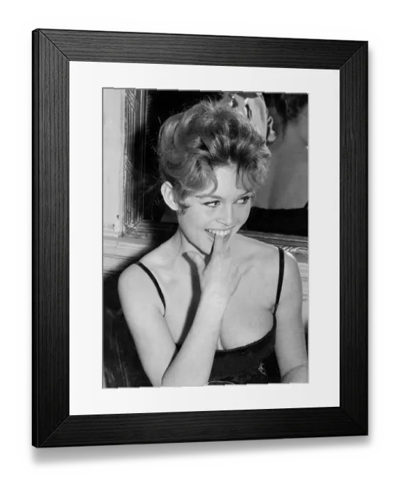 Framed Print : Brigitte Bardot With Her Finger In Mouth Framed Print : Brigitte Bardot With Her Finger In Mouth