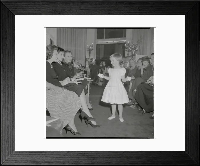 Framed Print : Actress Micheline Presle's Young Daughter Modeling for Audience Framed Print : Actress Micheline Presle's Young Daughter Modeling for Audience