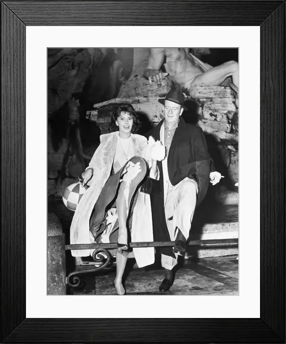 Framed Print : John Wayne and Sophia Loren are High-Stepping Sightseers Framed Print : John Wayne and Sophia Loren are High-Stepping Sightseers