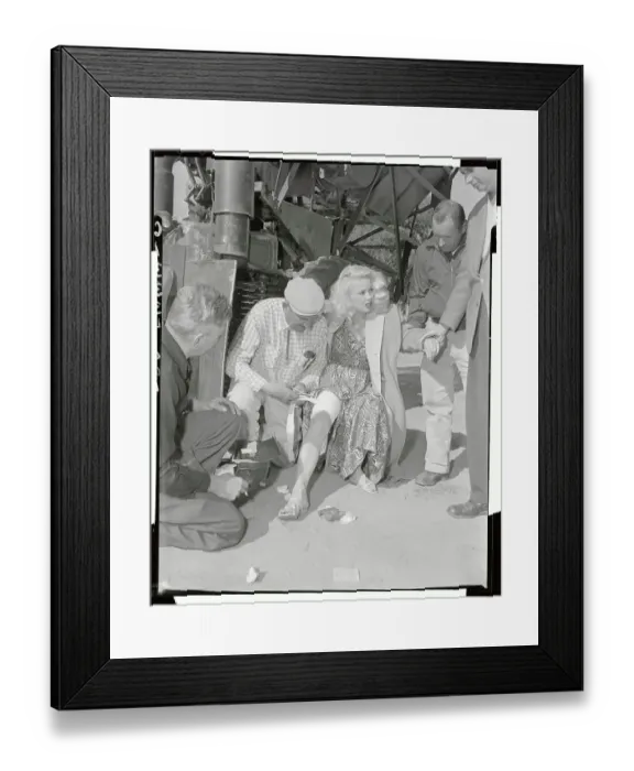Framed Print : Mamie Van Doren Being Treated by First Aid Man