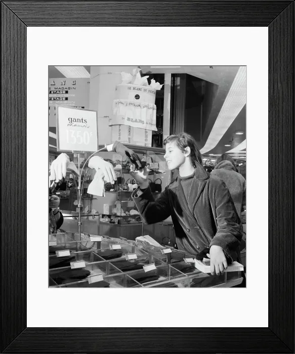 Framed Print : Shopper Looking at Gloves Near Hidden Security Camera Framed Print : Shopper Looking at Gloves Near Hidden Security Camera
