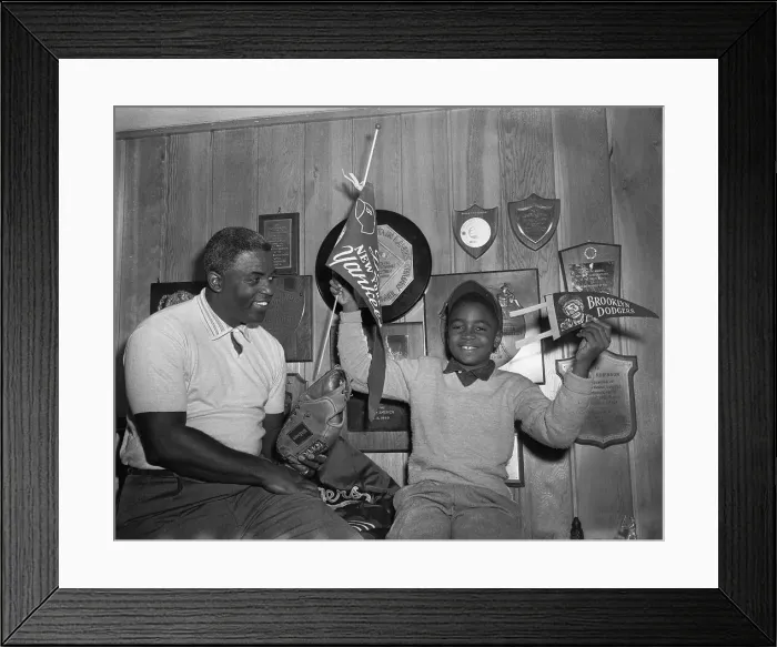 Framed Print : Jackie Robinson with His Son at Home Framed Print : Jackie Robinson with His Son at Home