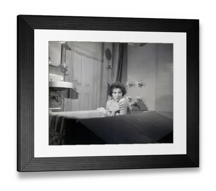 Framed Print : Joan Collins Covering Chest in Bathtub Framed Print : Joan Collins Covering Chest in Bathtub