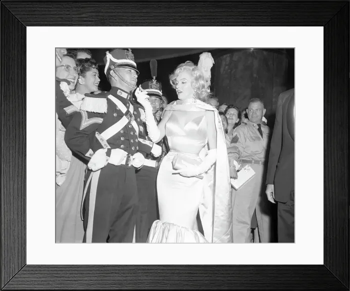 Framed Print : Marilyn Monroe Greeting Soldier in Elaborate Guard Uniform Framed Print : Marilyn Monroe Greeting Soldier in Elaborate Guard Uniform