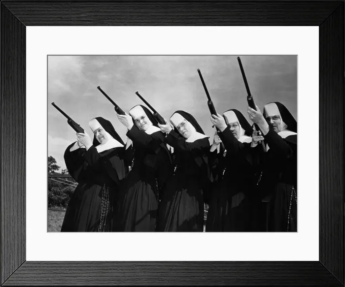 Framed Print : Row of Nuns Aiming Rifles Framed Print : Row of Nuns Aiming Rifles