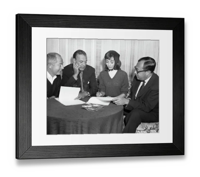 Framed Print : Audrey Hepburn an Gary Cooper Signing Contract Framed Print : Audrey Hepburn an Gary Cooper Signing Contract
