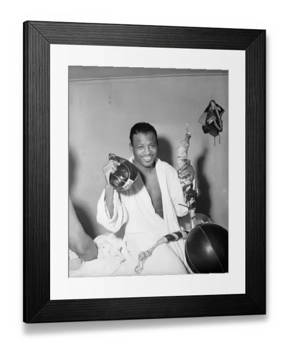 Framed Print : Sugar Ray Robinson with Broken Boxing Bag Framed Print : Sugar Ray Robinson with Broken Boxing Bag