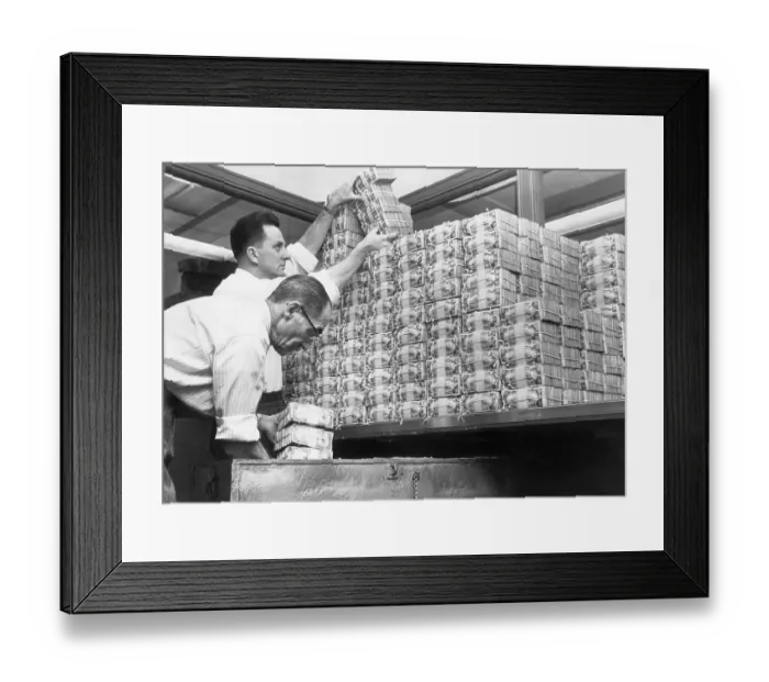 Framed Print : Bank Tellers Piling Stacks of US Dollars Framed Print : Bank Tellers Piling Stacks of US Dollars