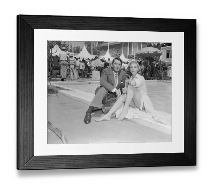 Framed Print : Gregory Peck and Lauren Bacall Sitting by Pool Framed Print : Gregory Peck and Lauren Bacall Sitting by Pool