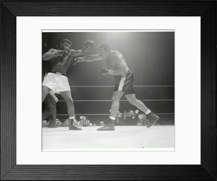Framed Print : Floyd Paterson Ducking Punch from Archie Moore