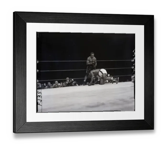 Framed Print : Archie Moore Standing Over Patterson Framed Print : Archie Moore Standing Over Patterson