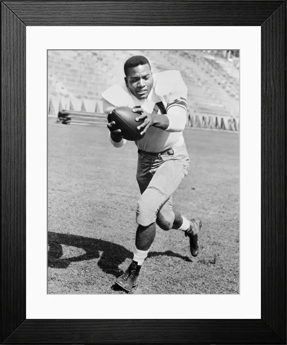 Framed Print : Portrait of Jim Brown Holding Football Framed Print : Portrait of Jim Brown Holding Football