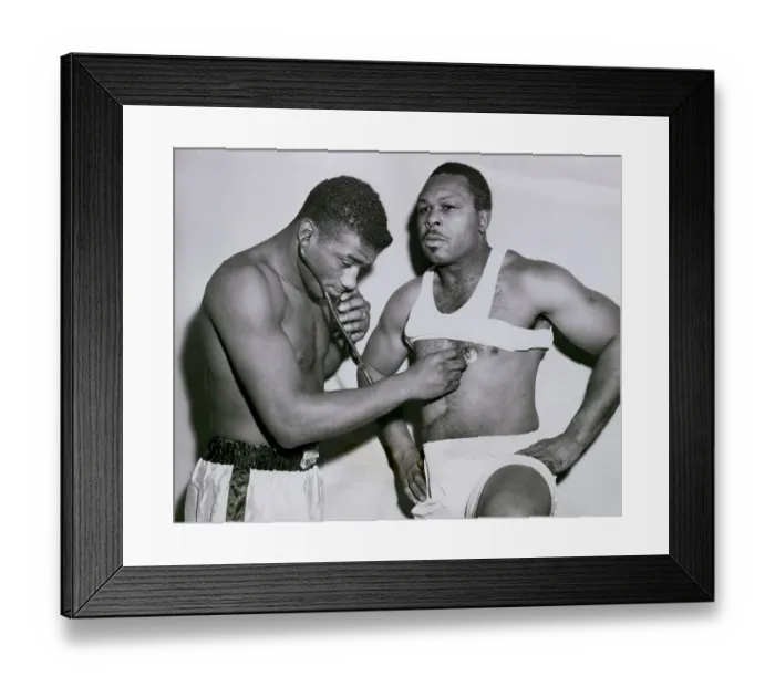 Framed Print : Floyd Patterson Listening to Archie Moore's Heart Framed Print : Floyd Patterson Listening to Archie Moore's Heart