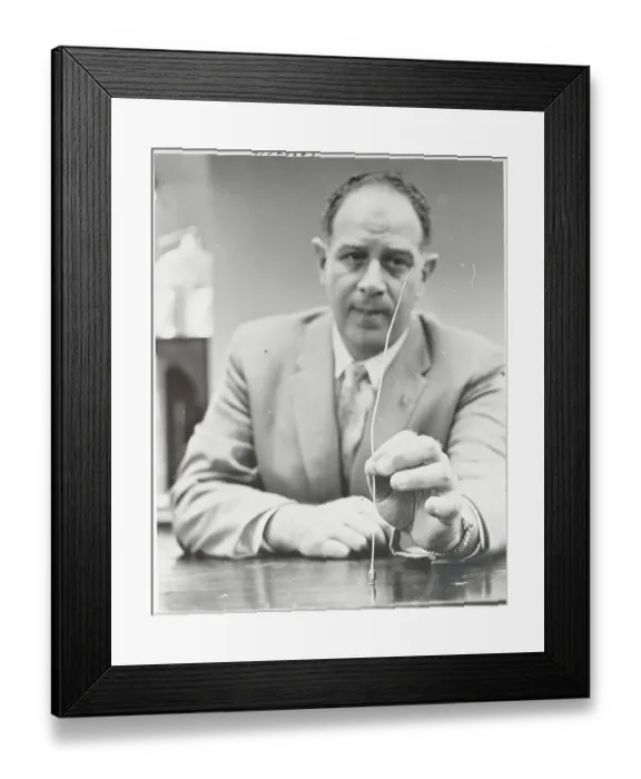 Framed Print : Doctor Displaying Curette Framed Print : Doctor Displaying Curette