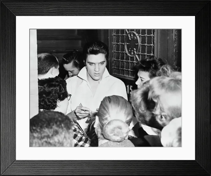 Framed Print : Elvis Presley Signs Girls Autographs Framed Print : Elvis Presley Signs Girls Autographs