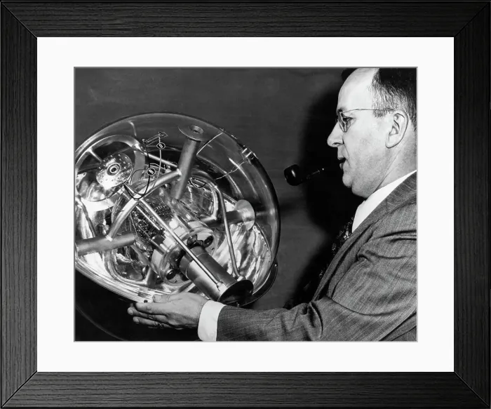 Framed Print : Man Displays Rocket Instrument Model Framed Print : Man Displays Rocket Instrument Model