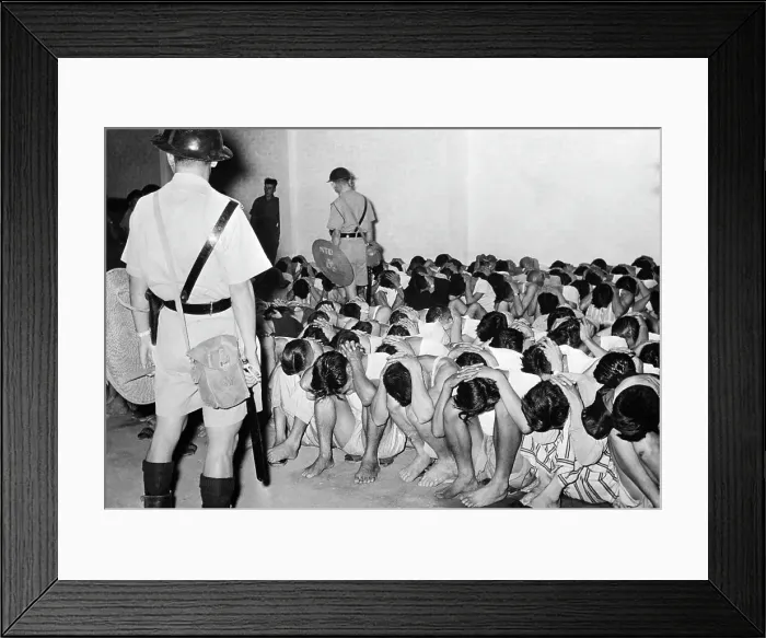 Framed Print : Group Of Guarded Rioters Crouching Framed Print : Group Of Guarded Rioters Crouching