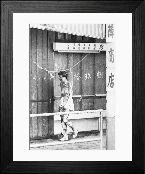 Framed Print : Injured Riot Victim Walking Framed Print : Injured Riot Victim Walking
