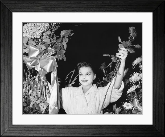 Framed Print : Judy Garland Holding Flowers Framed Print : Judy Garland Holding Flowers