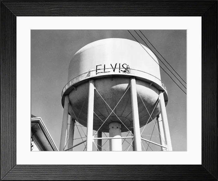Framed Print : Man Painting Elvis On Water Tower Framed Print : Man Painting Elvis On Water Tower