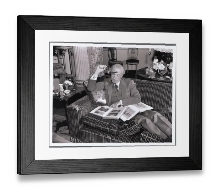 Framed Print : Multi Talented Cecil Beaton Reading While Poised on His Couch