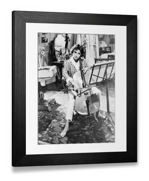 Framed Print : Audrey Hepburn Practicing Cello Framed Print : Audrey Hepburn Practicing Cello