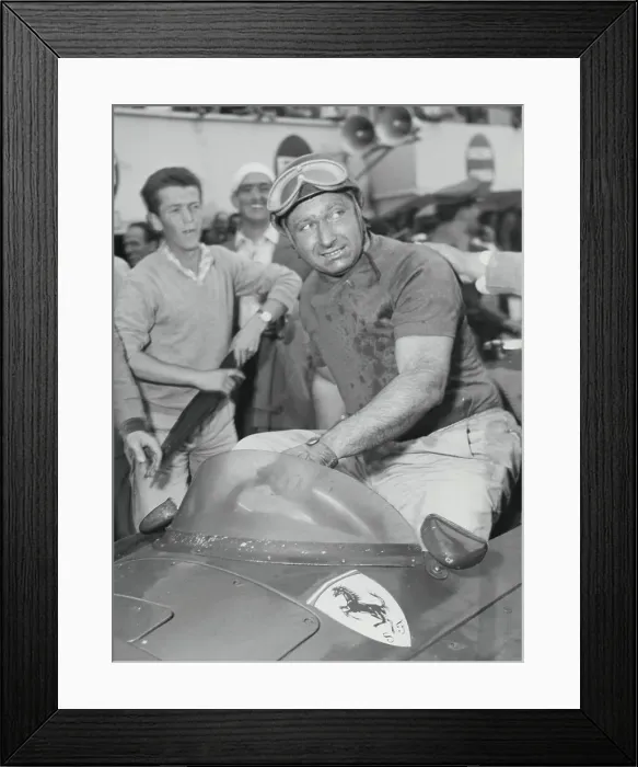 Framed Print : Manuel Fangio Climbing Out of His Car Framed Print : Manuel Fangio Climbing Out of His Car