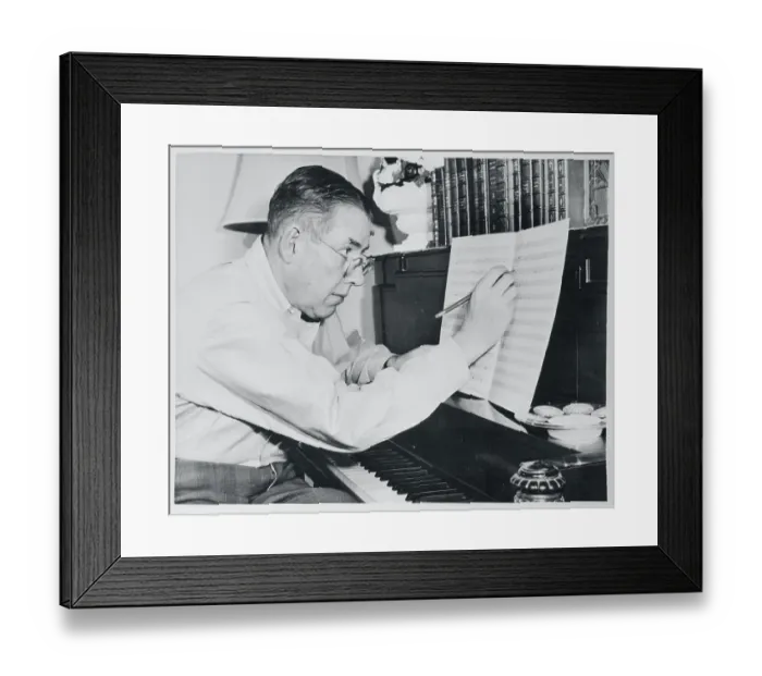 Framed Print : Ogden Nash Writing Lyrics onto Sheet of Music