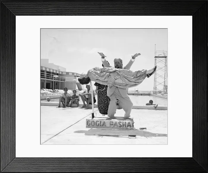 Framed Print : Indian Magician Suspends Woman on Sword