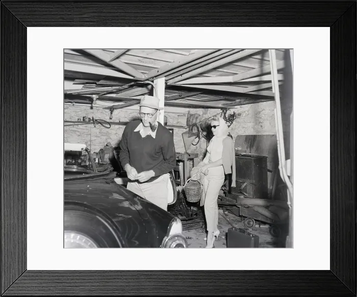 Framed Print : Arthur Miller And Marilyn Monroe in Garage