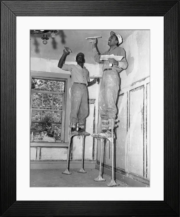 Framed Print : Two workers on stilts painting calling Framed Print : Two workers on stilts painting calling