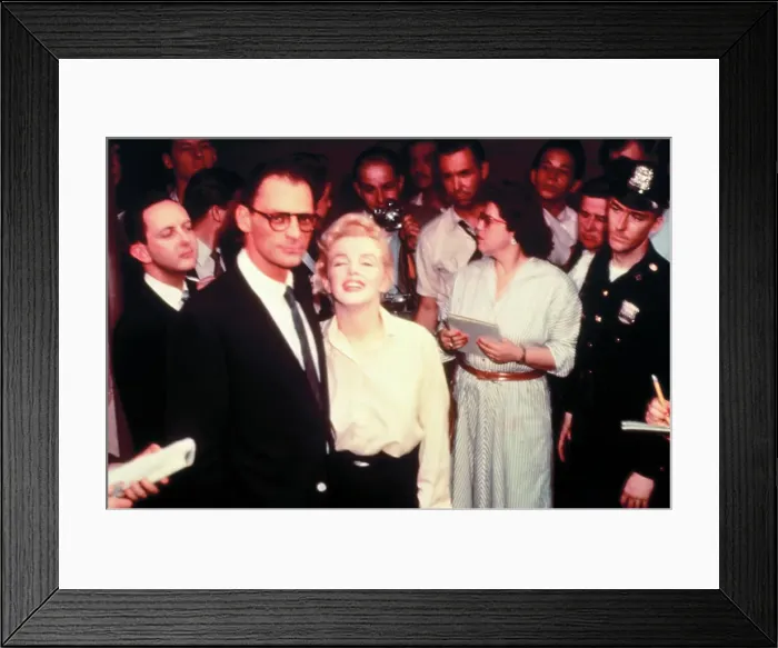 Framed Print : Marilyn Monroe and Arthur Miller Posing in Front of Press Group Framed Print : Marilyn Monroe and Arthur Miller Posing in Front of Press Group