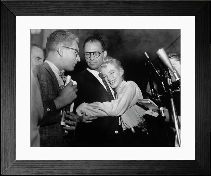 Framed Print : Actress Marilyn Monroe Hugging Arthur Miller