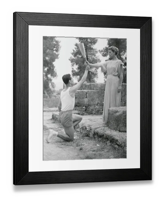 Framed Print : Actress Handing Torch to Runner Framed Print : Actress Handing Torch to Runner