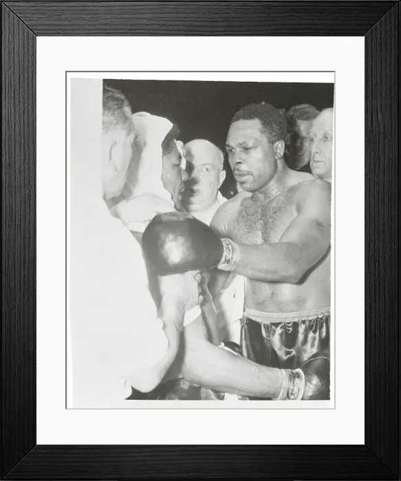 Framed Print : Boxer Archie Moore Acknowledging His Challenger After Fight