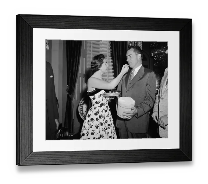Framed Print : Young Woman Hand Feeding Richard Nixon