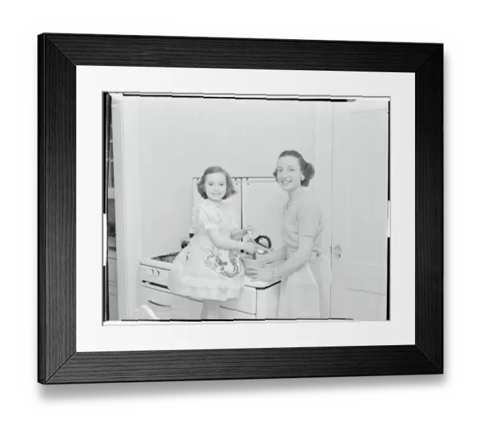 Framed Print : Mother Cooking with Her Daughter Framed Print : Mother Cooking with Her Daughter