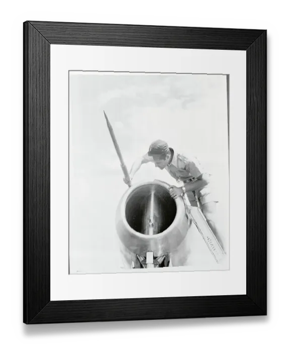Framed Print : Examining Jet Framed Print : Examining Jet