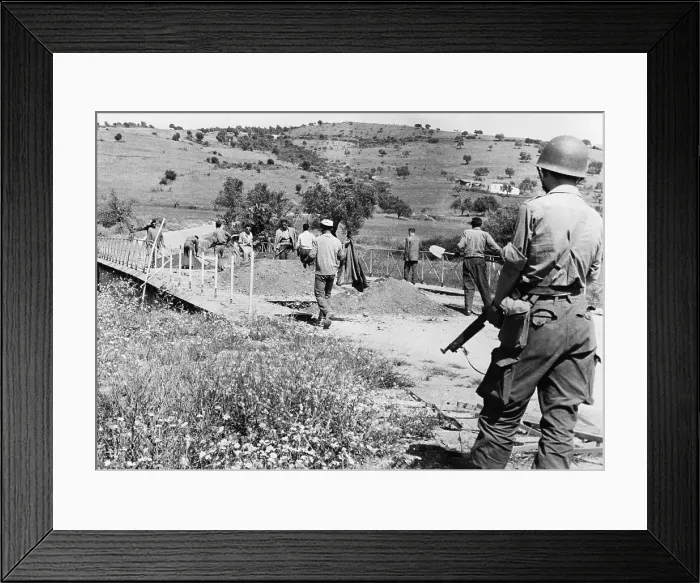 Framed Print : Soldier Overseeing Bridge Repairs Framed Print : Soldier Overseeing Bridge Repairs