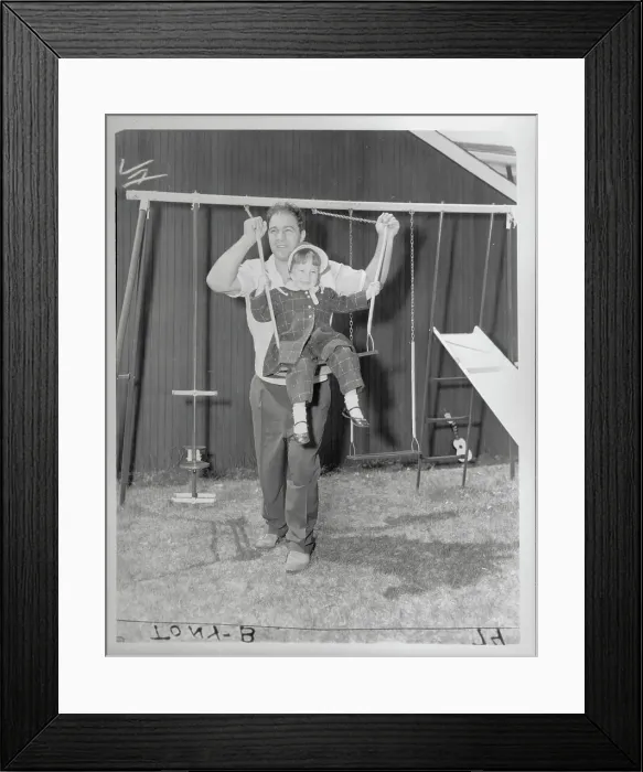 Framed Print : Rocky Marciano Swinging Daughter Outside Framed Print : Rocky Marciano Swinging Daughter Outside