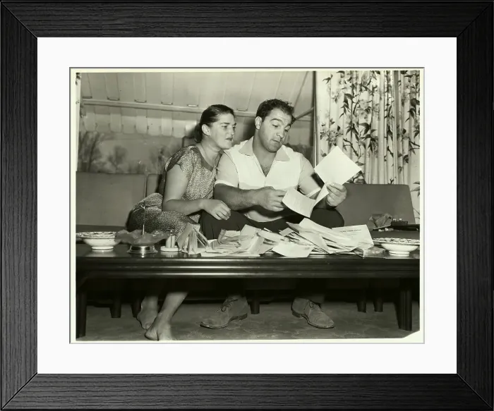 Framed Print : Rocky Marciano Reading Fan Mail with Wife Framed Print : Rocky Marciano Reading Fan Mail with Wife