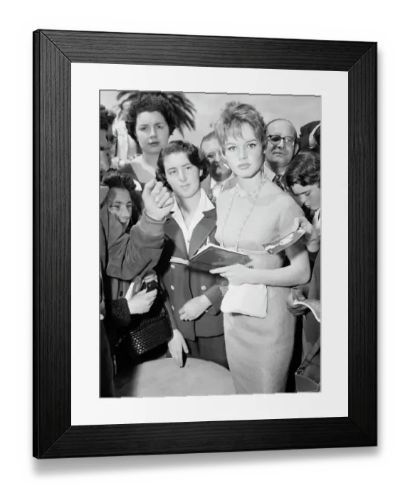 Framed Print : Brigitte Bardot Signs Autographs with Fans Framed Print : Brigitte Bardot Signs Autographs with Fans