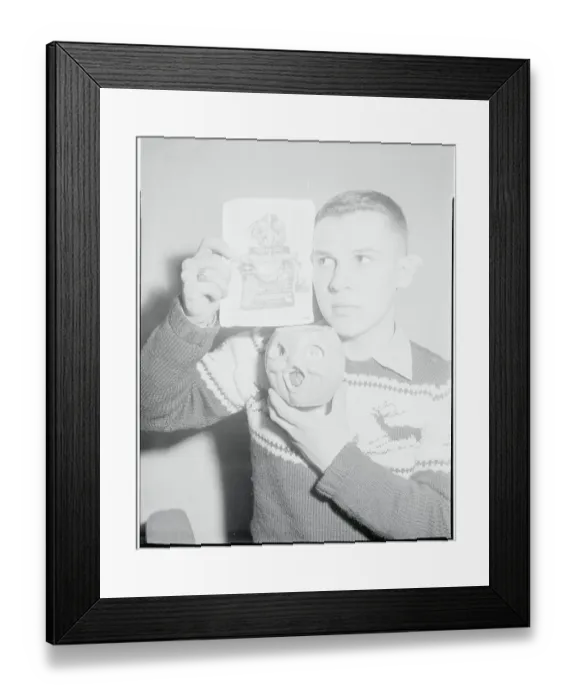 Framed Print : Ronald Mucha Holding a Pumpkin and Photograph Framed Print : Ronald Mucha Holding a Pumpkin and Photograph