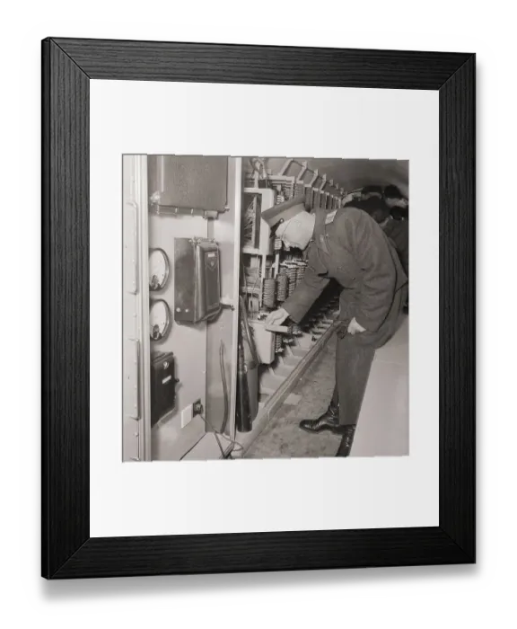Framed Print : Russian Officer Reading a Fire Extinguisher's Label Framed Print : Russian Officer Reading a Fire Extinguisher's Label