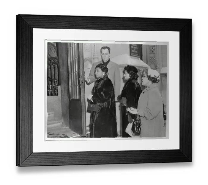 Framed Print : Man Holding Door Open for Women