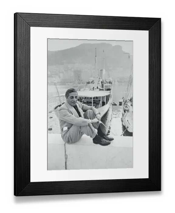 Framed Print : Aristotle Onassis Sitting on Side of Pier Framed Print : Aristotle Onassis Sitting on Side of Pier