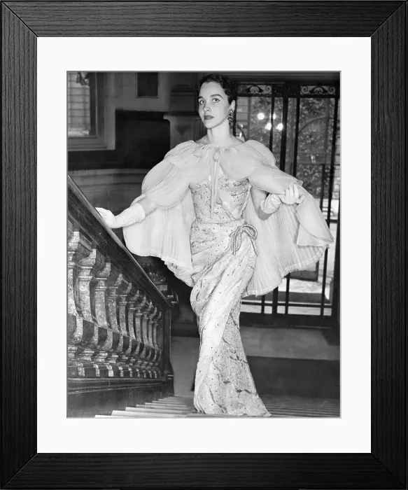 Framed Print : Model Walking up Staircase in Formal Dress Framed Print : Model Walking up Staircase in Formal Dress