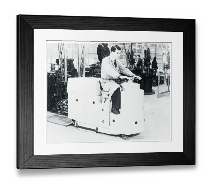 Framed Print : Man Riding Battery Powered Scrubbing Machine Framed Print : Man Riding Battery Powered Scrubbing Machine